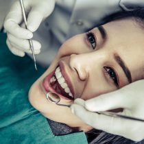 Dentists treat patients' teeth.