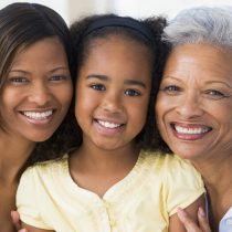 Grandmother with adult daughter and grandchild